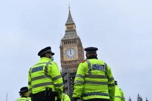 UK charges three with working for Hong Kong intelligence
